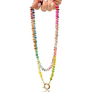 A rainbow multi-gemstone necklace that is handknotted   & handcrafted.  Made from natural semi precious gemstones.  This necklace is sure to add a pop of color to any outfit