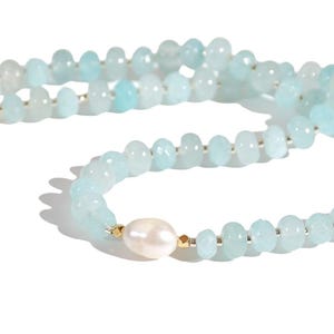 Light blue aquamarine Gem Necklace hand made with silver and gold spacer beads. 
 It is a beautiful Boho Chic Statement Necklace for the Summer in colors of soft  blue.