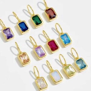 Gold birthstone charms featuring bezel-set gemstones for each month, designed for custom necklaces and bracelets.  14k gold vermeil 925 Sterling silver