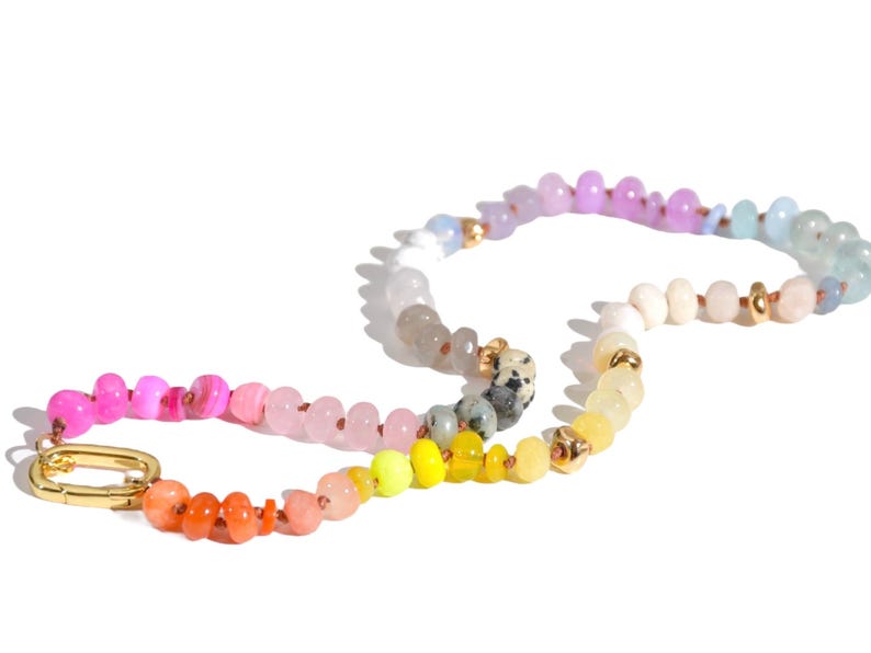 Candy Colored Long Beaded Gem Necklace featuring neon colored rainbow gemstones and opal rainbow beads. 
 It is a beautiful Boho Chic Statement Necklace for the Summer in colors of bright neon pinks , purples, oranges, pastels and yellows.
