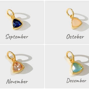 14k gold vermeil birthstone charms in a triangular bezel setting, each featuring a different colored gemstone, arranged neatly on a white background. Designed for necklaces and bracelets.
