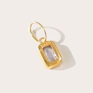 Gold birthstone charms featuring bezel-set gemstones for each month, designed for custom necklaces and bracelets.  14k gold vermeil 925 Sterling silver