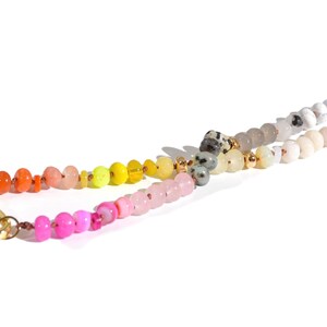 Candy Colored Long Beaded Gem Necklace featuring neon colored rainbow gemstones and opal rainbow beads. 
 It is a beautiful Boho Chic Statement Necklace for the Summer in colors of bright neon pinks , purples, oranges, pastels and yellows.