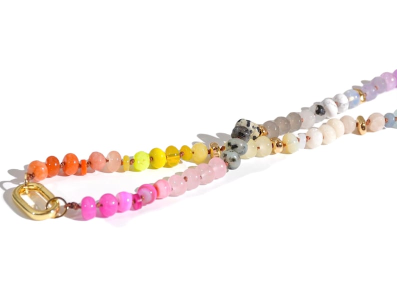 Candy Colored Long Beaded Gem Necklace featuring neon colored rainbow gemstones and opal rainbow beads. 
 It is a beautiful Boho Chic Statement Necklace for the Summer in colors of bright neon pinks , purples, oranges, pastels and yellows.