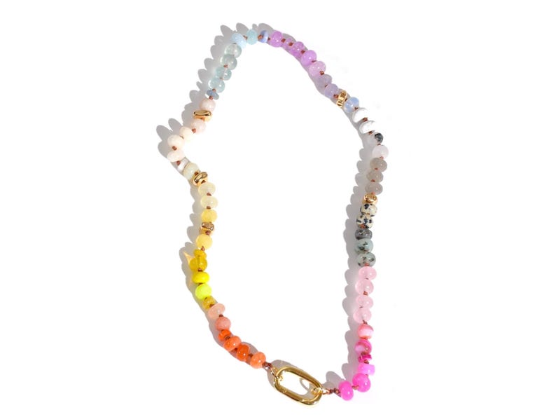 Candy Colored Long Beaded Gem Necklace featuring neon colored rainbow gemstones and opal rainbow beads. 
 It is a beautiful Boho Chic Statement Necklace for the Summer in colors of bright neon pinks , purples, oranges, pastels and yellows.