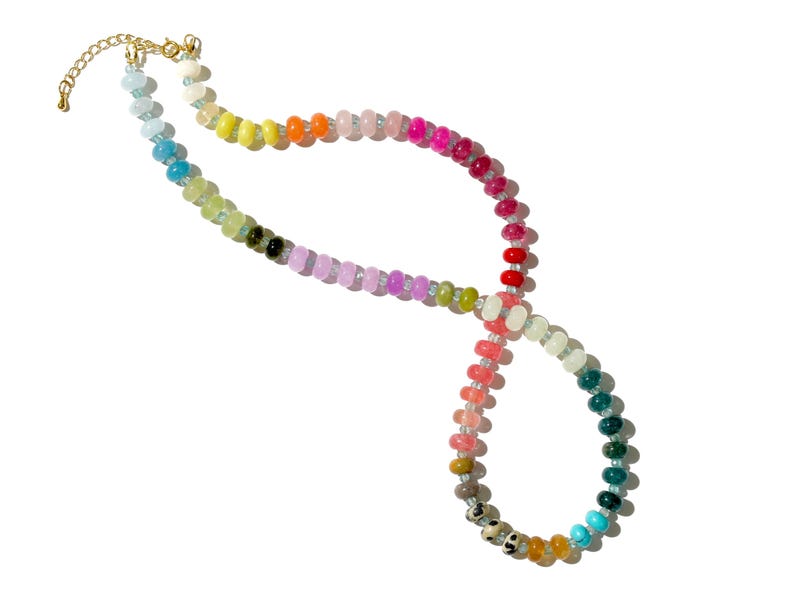 A rainbow multi-gemstone necklace from natural semi precious gemstones and apatite beads.  This necklace is sure to add a pop of color to any outfit