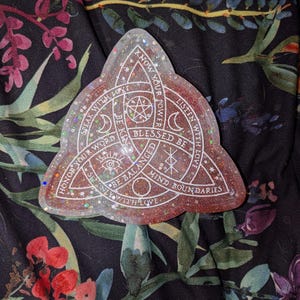 May include: A glittery, triangular resin tray with a spiritual theme. The tray is a mix of brown and clear resin with embedded glitter. White text includes phrases like "Know Your Power" and "Blessed Be."