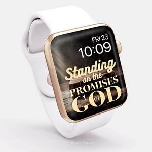 May include: A white Apple Watch with a gold-colored band and a black face. The face displays the time, "10:09", and the text "Standing on the Promises of God".