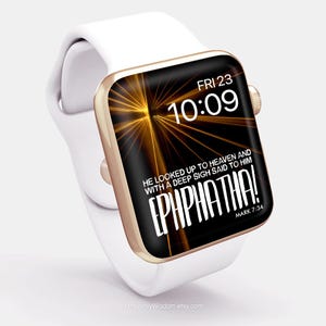 May include: A white smartwatch with a gold-colored bezel displays the time, date, and the text "EPHPHATHA!" against a black and gold background. The watch band is white, and the screen shows "HeavenlyWisdom.etsy.com".