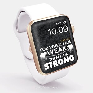 May include: A white smartwatch with a gold-colored bezel displays the time and a motivational quote. The watch face is black with white text that reads "FOR WHEN I AM WEAK THEN I AM STRONG." The watch band is white.