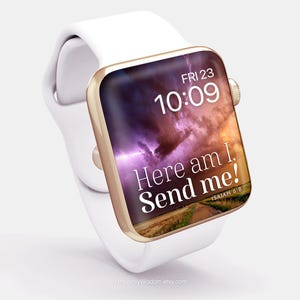 May include: White smartwatch with a gold-colored bezel. The watch face displays a dramatic sky scene with the text "Here am I. Send me!" and the time 10:09. The band is white.