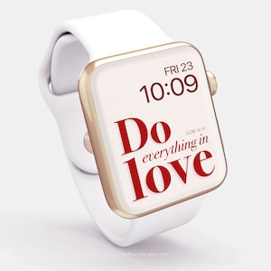 May include: White Apple Watch with a gold trim displaying the time 10:09 and the text "Do everything in love" with the scripture reference 1 Cor 16:14.