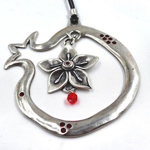 Pomegranate design, an original example handcrafted from pewter.