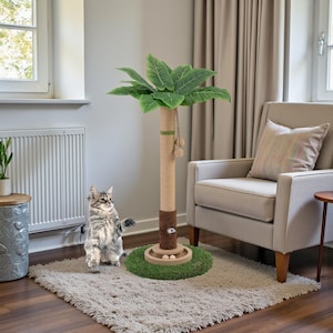May include: A cat scratching post designed to look like a palm tree. The post has a sisal-wrapped trunk, a green base, and artificial green leaves at the top. The cat is standing on a fluffy rug.