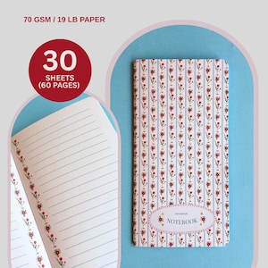 May include: A notebook with a floral pattern of red flowers and blue stripes. It contains 30 sheets (60 pages) of lined paper. The cover reads "Handmade Notebook". The paper is 70 gsm / 19 lb.