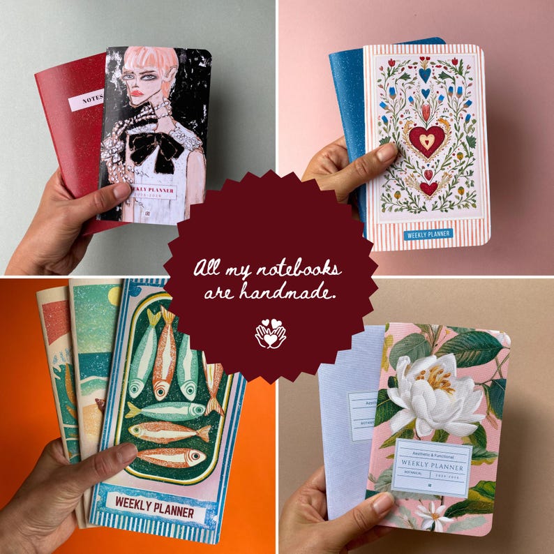 May include: A collection of handmade notebooks with various covers. One red notebook has "NOTES" on a label. Other notebooks feature illustrations of a fashion portrait, floral designs, and fish. The text "WEEKLY PLANNER" is visible on some.