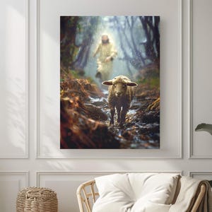 May include: A canvas print depicts a lamb walking towards the viewer on a muddy path, with a figure in the background. The artwork is set in a forest with a soft, diffused light, creating a serene and spiritual atmosphere.