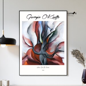May include: A poster featuring an abstract painting of a tree by Georgia O'Keeffe. The painting is titled "Autumn Tree: The Maple" and is dated 1924. The colors in the painting are mostly shades of red, brown, and gray.