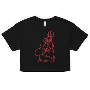 May include: A black cropped t-shirt with a red outline of a devil woman holding a trident.
