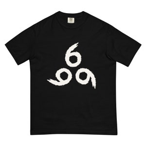 May include: Black t-shirt with a white graphic of three stylized 6's arranged in a triangle.