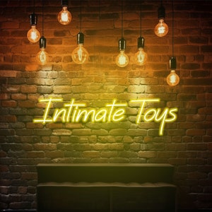 Insegna al neon dei giocattoli intimi per il sexy shop