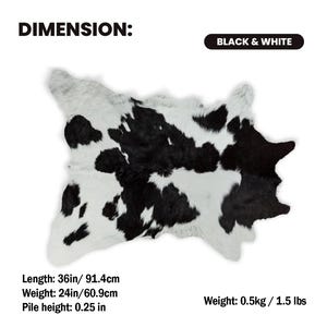 May include: Black and white cowhide rug. The rug is 36 inches long, 24 inches wide, and has a pile height of 0.25 inches. The weight is 1.5 lbs. The rug has a natural shape with black and white spots.