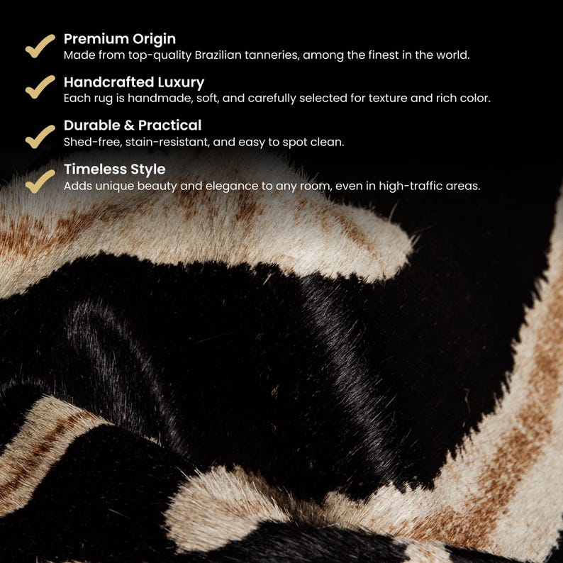 May include: Close-up of a rug with a black and tan zebra stripe pattern. The rug has a soft texture and is made from high-quality materials. The image also includes text that describes the rug's features, such as its premium origin and timeless style.