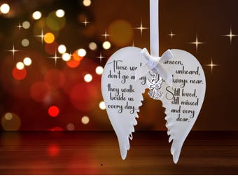 Adorno navideño con alas de ángel en memoria, de acrílico esmerilado.