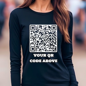 May include: A black long-sleeve shirt with a white QR code and the text "YOUR QR CODE ABOVE" printed on the front.