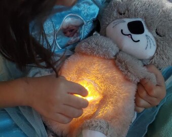 Breathing Otter Plush: Sensory Light & Sound, Newborn Baby Gift, Musical Doll for Soothing Sleep