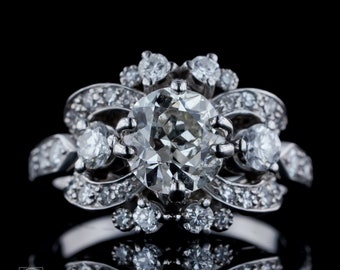 Art Deco Era Estate GIA Certified Diamond Engagement Ring in Platinum