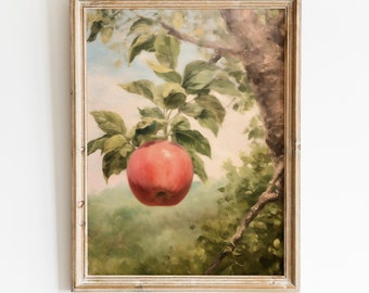 May include: A framed painting depicting a red apple hanging from a tree branch. The painting features a background of green foliage and a blue sky.