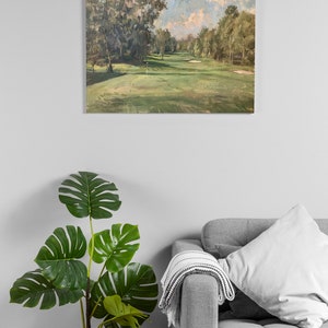 May include: A painting of a golf course with green grass and trees in the background. The sky is blue with white clouds.