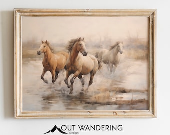May include: A framed painting of three horses running through a misty field. The horses are brown and white, and the painting has a soft, muted color palette.