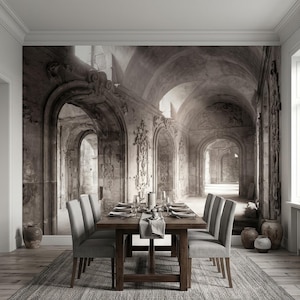 May include: A dining room set featuring a dark wood table and six gray upholstered chairs. The table is set with plates, glasses, and cutlery. The backdrop is a sepia-toned mural of an arched stone hallway.