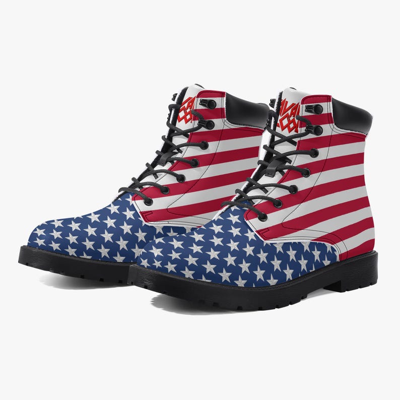 May include: Pair of combat boots featuring a patriotic design. The boots have a blue star-patterned toe and a red and white striped upper, resembling the American flag. They have black laces and soles.