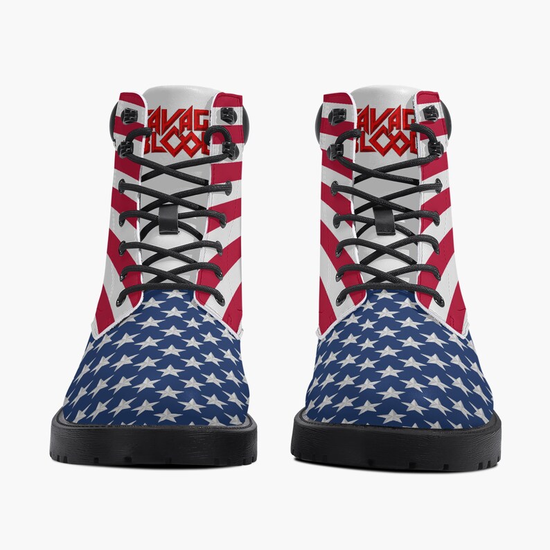 May include: Pair of combat boots featuring a patriotic design. The boots display a blue star pattern on the lower portion and red and white stripes on the upper part. The boots have black laces and soles, with the text "SAVAGE BLOOD" in red.
