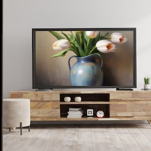 May include: A still life painting of white tulips in a blue and white ceramic vase. The vase is on a table with a brown background.