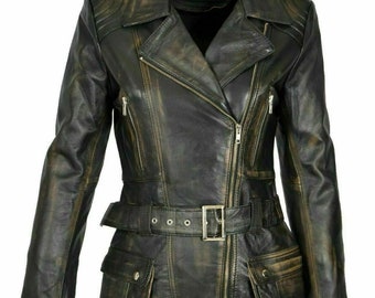 May include: A black leather jacket with a belted waist and multiple pockets. The jacket has a distressed look with a faded, worn appearance.