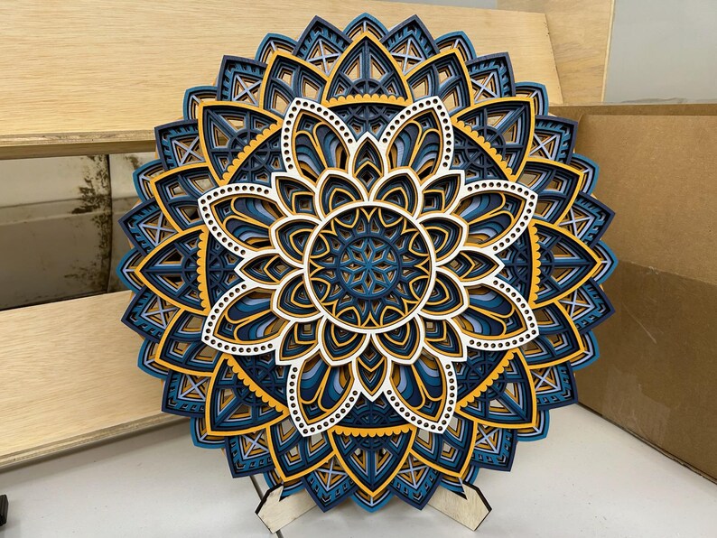This is my 7 layer 19.5" Snowflake Mandala. With the color pattern "midnight"