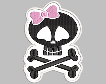 Geborduurd strijkpatch met doodskop en strik.