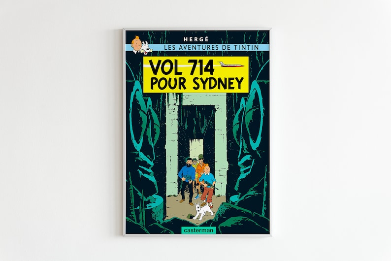May include: A vintage comic book cover featuring Tintin and his friends in a jungle setting. The cover is yellow with the title "VOL 714 POUR SYDNEY" in black text. The comic book is titled "Les Aventures de Tintin" by Herg&eacute;.