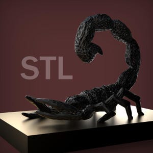May include: A black 3D printed scorpion sculpture with a detailed, textured surface. The sculpture is posed with its tail curled up and its claws extended. The word "STL" is visible in the background.