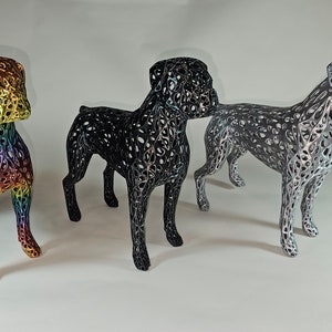 May include: Three wireframe sculptures of a boxer dog, each in a different color: rainbow, black, and silver.