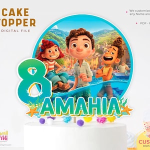 May include: A digital cake topper featuring Luca and Alberto from the Disney Pixar movie Luca. The topper is a circle with a blue and green ocean background. The number 8 is in the foreground with the name "AMAHIA" below it.