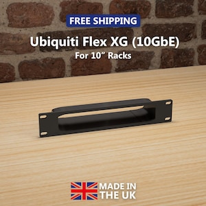 May include: A black Ubiquiti Flex XG (10GbE) rack mount for 10-inch racks. The product is made in the UK. The image shows the product on a wooden surface with a brick wall background. The text "FREE SHIPPING" is visible.