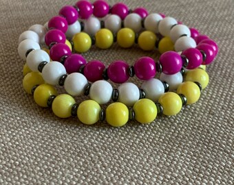 Bright colors of yellow, fushia and white beaded bracelet stack.  Gifts for her, women’s bracelets, friendship bracelets, cute bracelets