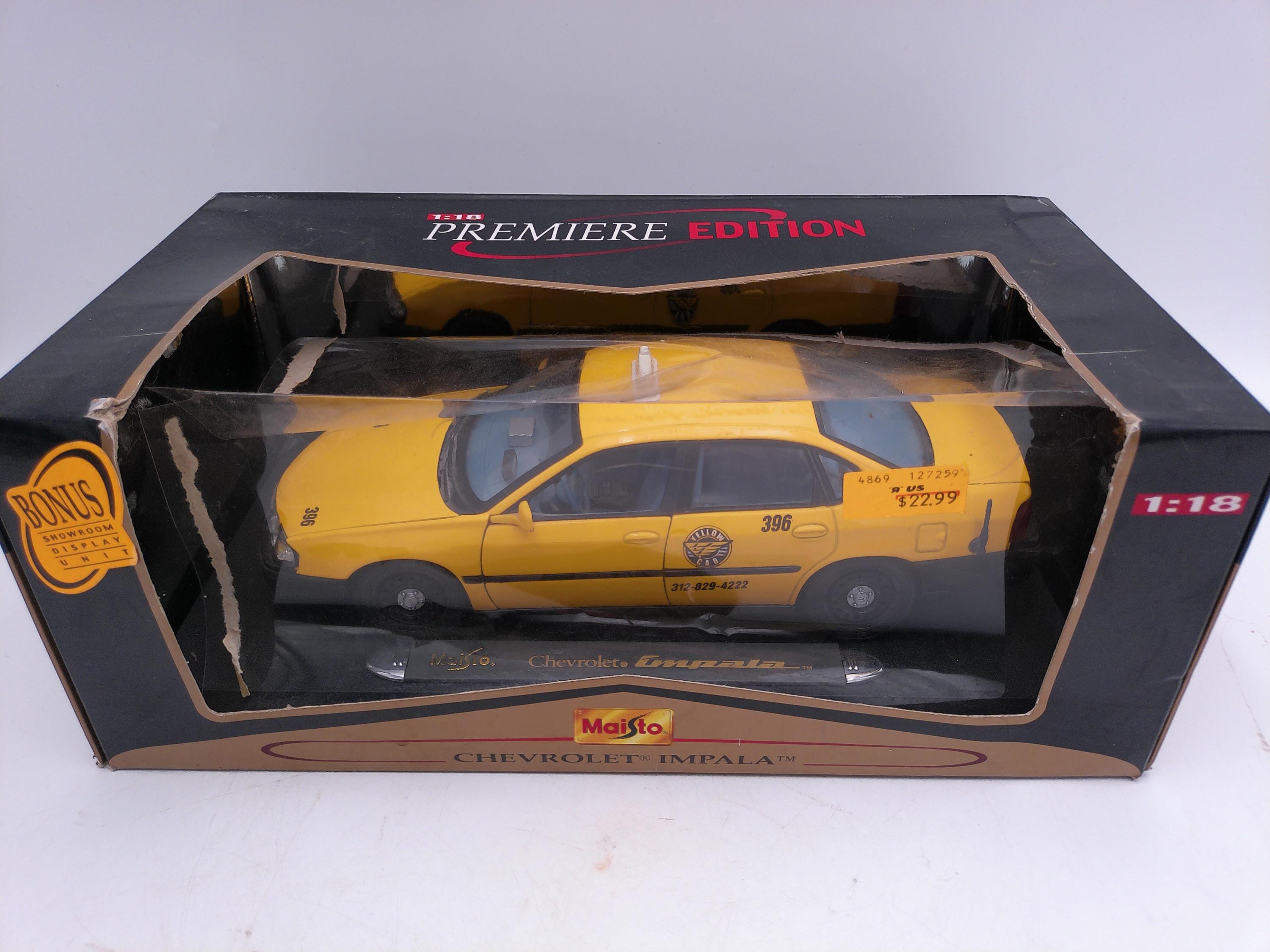 Maisto 1:18 Scale Diecast Model Of A Chevrolet Impala Yellow Cab #232242