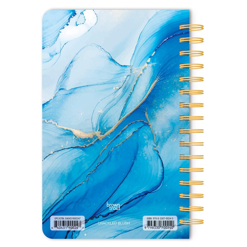 May include: A blue and gold spiral bound notebook with a marbleized design. The cover features the text "brown trout" and "CRACKLED BLUSH". The UPC code is 840431190024 and the ISBN is 978-3-507-00024-0.