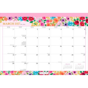 May include: A March 2027 wall calendar featuring a floral border with pink, orange, purple, and blue flowers at the top and bottom. The grid displays days of the month with small text for holidays and a February and April 2027 calendar at the bottom.